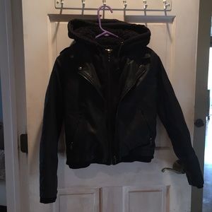 Woman’s leather jacket with built in sweatshirt